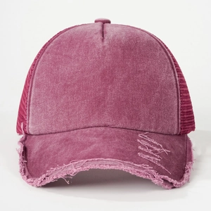 Vintage washed purple trucker hat with distressed details and mesh back for breathability