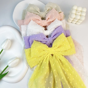 Elegant purple and pastel chiffon oversized bow hair clips with soft velvet polka dots