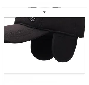 Detail of winter baseball cap featuring foldable ear flaps and thickened warm fabric