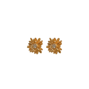Elegant gold flower stud earrings with a central sparkling zircon on a clean white backdrop
