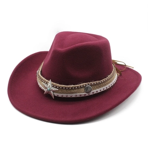 Detailed view of burgundy wool felt cowboy hat with star buckle and turquoise bead band