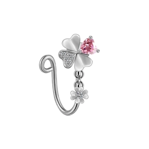 Detailed shot of clover nose clip with pink heart stone and silver flower pendant