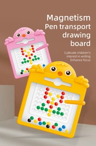 Detail of magnetic drawing board with colorful beads and cartoon bird shapes for kids