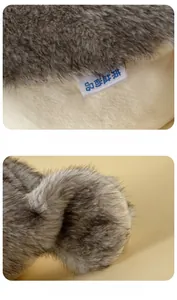 Dettaglio delle cuciture sottili e della morbida trama di peluche sulla coda della foca