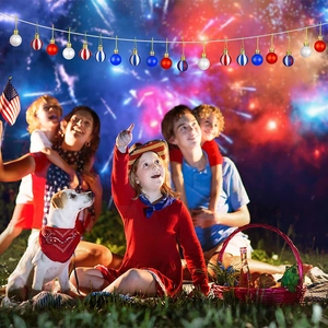 Patriotic USA flag ornaments displayed in a festive outdoor family gathering scene