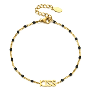 Close-up of golden stainless steel chain featuring KISS pendant and black beads detail
