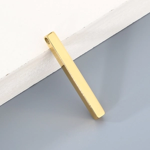 Detail of 18K gold-plated stainless steel vertical bar pendant with polished finish
