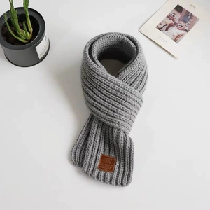 Toddler gray knitted dinosaur winter hat with warm fleece lining and ear protection