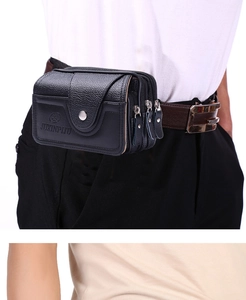 Detail of black lychee grain PU leather waist bag with multiple zipper compartments