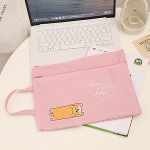 Pink cartoon dog A4 document bag detail with zipper closure and durable handles