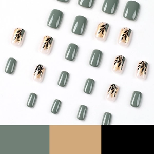 Short square press-on nail kit with dark green finish and gold leaf foil accent patterns