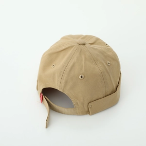 Rear view of khaki docker cap showing adjustable velcro strap and twill fabric texture