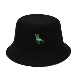 Classic black cotton bucket hat with a cute green frog embroidery in a casual street style