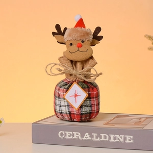Detail of Christmas reindeer burlap gift bag with red plaid pattern and drawstring tie