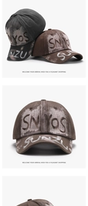 Close-up of vintage washed denim texture and graffiti print on baseball caps