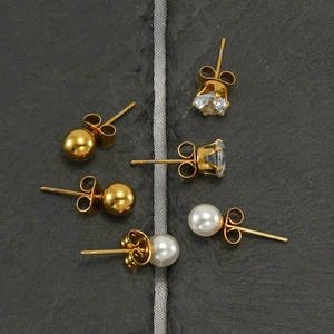 Three pairs of stainless steel stud earrings featuring pearls, zircons and gold beads