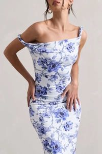 Detail of blue floral print on white off-shoulder bodycon dress with side ruching