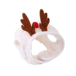 Detail of white plush reindeer pet headpiece with brown antlers and red pom pom accent