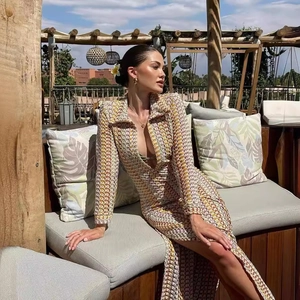 Handmade crochet hollow beach maxi dress with deep V-neck and vibrant geometric pattern
