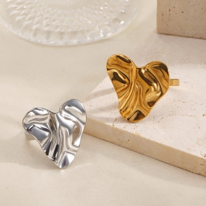Minimalist irregular heart ring with crumpled texture in gold and silver finish
