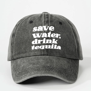 Detail of save water drink tequila slogan on distressed dark grey cotton baseball cap