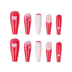 Red heart press-on nails with French tips and pink marble design in a long coffin shape