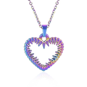 Macro shot of heart pendant necklace with rainbow finish and jagged edge detail