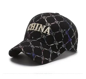 Detail of 3D silver China embroidery and gradient lettering on black baseball cap