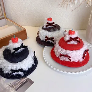Creative cake-shaped hair clips with plush cherry design in black, brown, and red colors