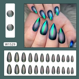 Detailed view of dark green cat eye press-on nails in 24 pieces with almond shape