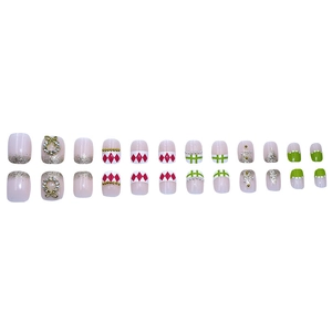 Sparkly pearl press-on nails set with pink and green floral patterns and 3D bow accents
