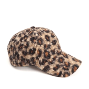 Close-up of leopard print baseball cap showing thick plush faux fur texture and seams