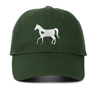 Close-up of the horse and heart embroidery on the dark green cotton baseball cap
