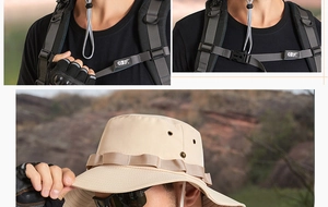 Detail of outdoor sun hat featuring wide brim, adjustable chin strap and breathable side vents