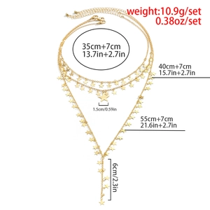 Tabella delle taglie dettagliata per collana a strati con stelle dorate e misure del prodotto