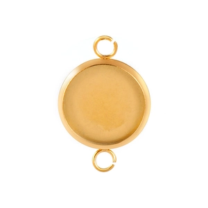 Macro detail of a golden stainless steel round gemstone base tray with dual loops