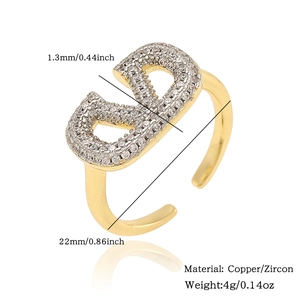 Detailed view of gold-plated V-shaped copper ring with zircon inlays and dimensions