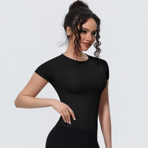 Close-up of black slimming yoga t-shirt with breathable fabric and athletic fit
