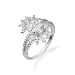 Macro detail of S925 silver ring featuring cushion cut stone and marquise floral petals