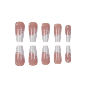 Christmas press-on nails with white snowflakes and nude pink gradient coffin shape