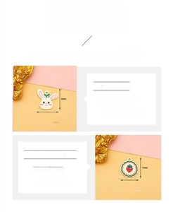 Detail view of cute bunny and strawberry alloy charms with dimensions and weights
