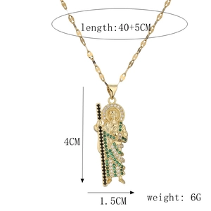Detailed view of gold necklace pendant with green stones showing size 40+5CM and weight 6G