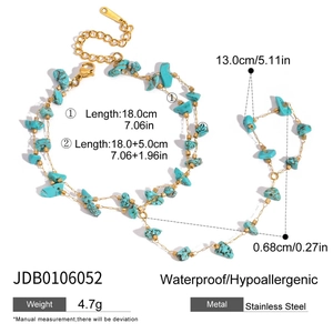 Detail of stainless steel hand chain with turquoise beads and precise measurements