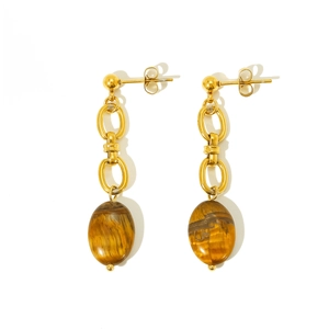 Detail of vintage gold chain earrings featuring polished oval tiger eye stones