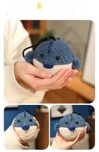 Détails de la peluche poisson-globe en tissu bouclé avec effet de rebond lent