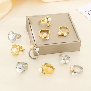 Exaggerated geometric stainless steel rings with shell pearls in gold and silver finish