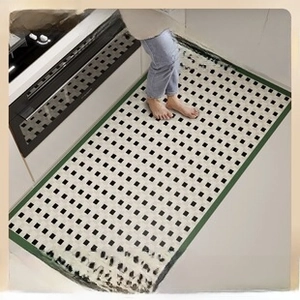 Macro detail of check pattern leather kitchen mat with waterproof oil-resistant surface