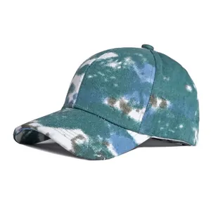 Retro tie-dye cotton baseball cap with green and blue camo print shown from a 45-degree angle