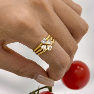 Three-layer gold titanium steel ring featuring a sparkling clover heart zircon design
