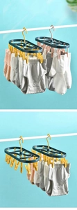 Close-up of multi-clip plastic clothes hanger with windproof hook for socks and underwear